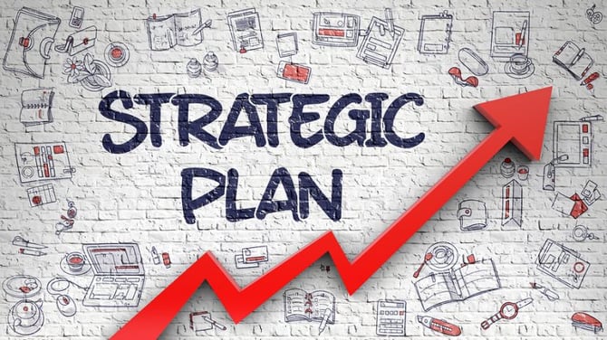 a white brick background with the text strategic plan and a red jagged arrow moving upward for left to right