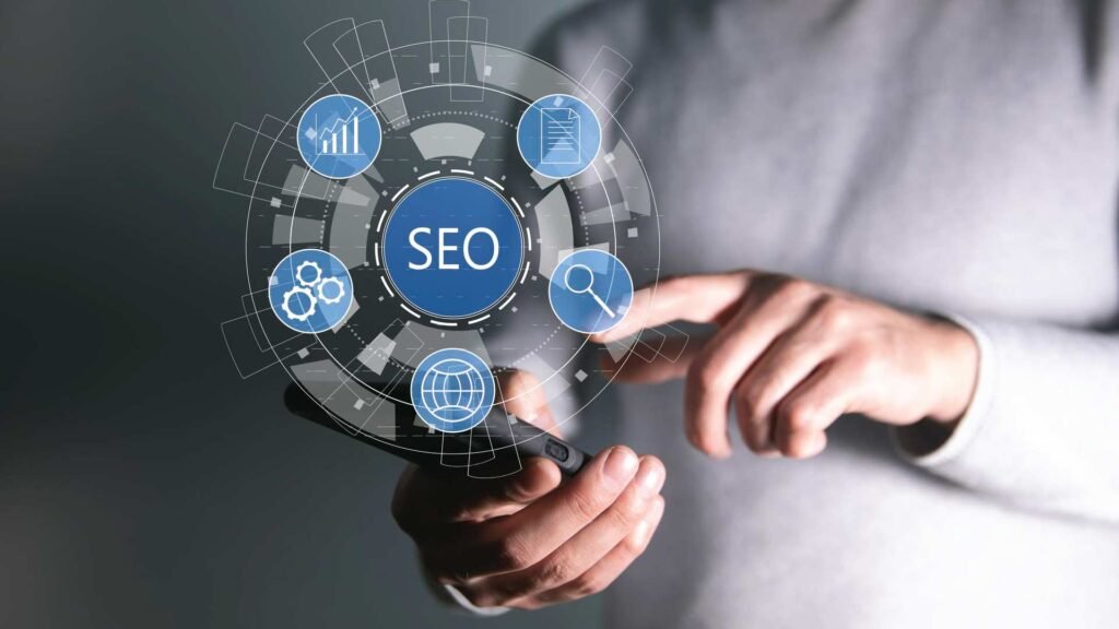 background of a person pointing to an overlaid screen showing icons of SEO and related images